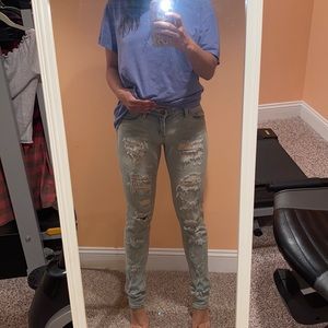 Ripped light wash Blank jeans